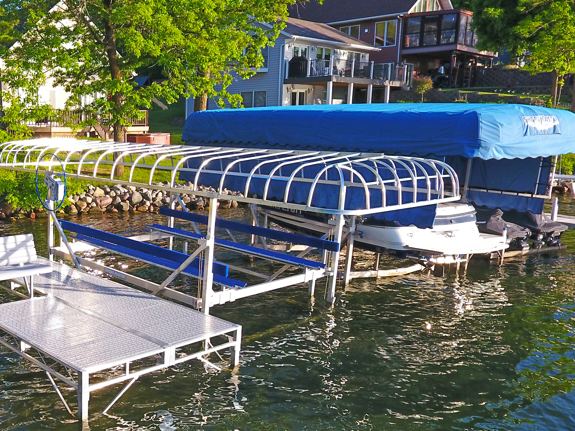 boat dock with a blue TowerMaxx Canopy
